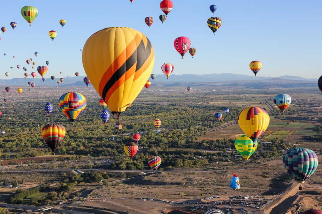 High Angle Shot Of Airborne Multi-Colored Hot Air Balloons during the Albuquerque International Balloon Fiesta 
