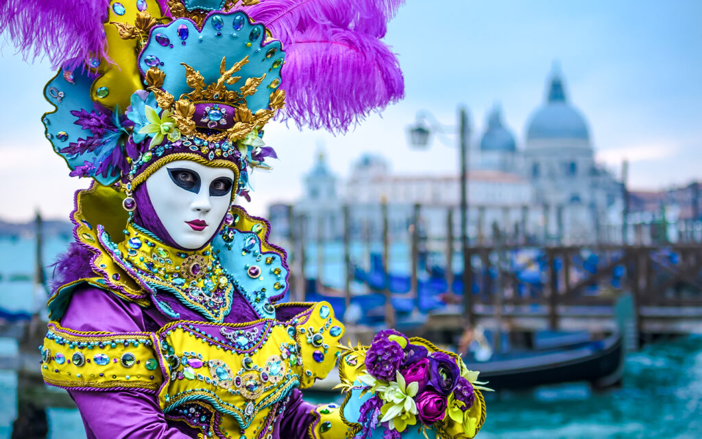 Picture of a woman wearing carnival clothes during the Carnival of Venice.