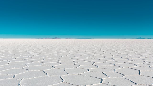 Picture of the Uyuni Salt Flats with a blue sky as a background