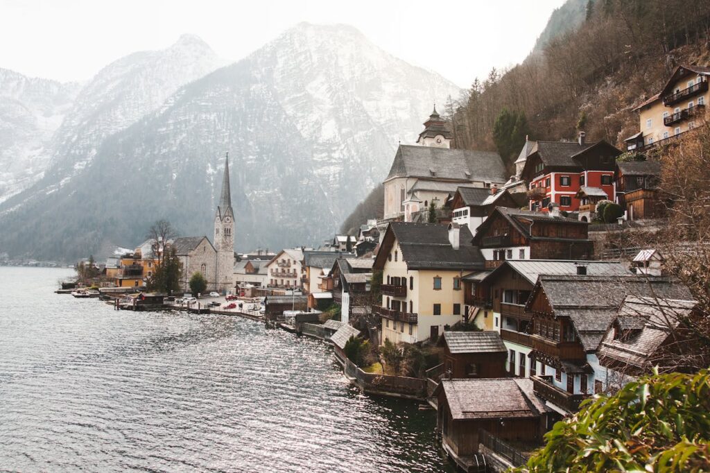 A picture of a beautiful seaside town of Hallstatt, Austria on a snowy day